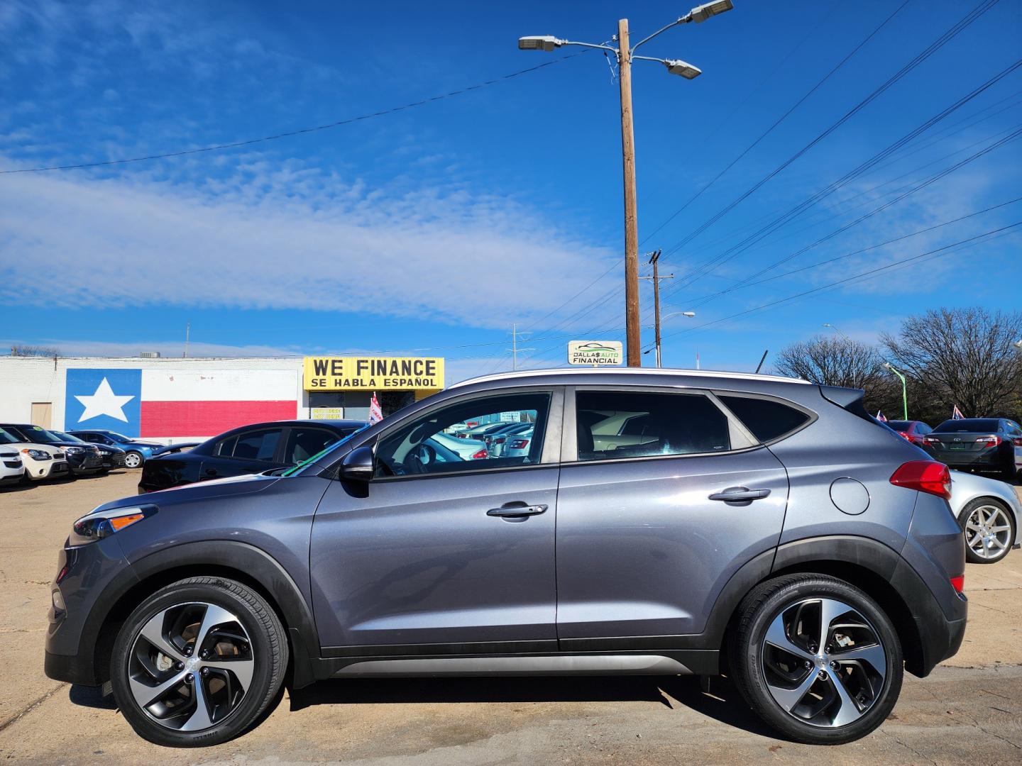 2016 BLACK Hyundai Tucson Sport (KM8J33A21GU) with an 1.6L L4 DOHC 16V engine, 7A transmission, located at 2660 S.Garland Avenue, Garland, TX, 75041, (469) 298-3118, 32.885551, -96.655602 - Welcome to DallasAutos4Less, one of the Premier BUY HERE PAY HERE Dealers in the North Dallas Area. We specialize in financing to people with NO CREDIT or BAD CREDIT. We need proof of income, proof of residence, and a ID. Come buy your new car from us today!! This is a Very clean 2016 HYUNDAI TUC - Photo#6